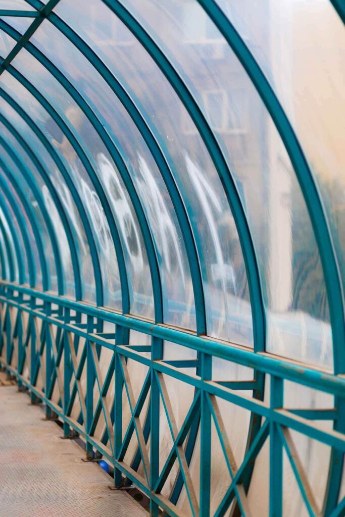 building with curved-secure glass balustrades